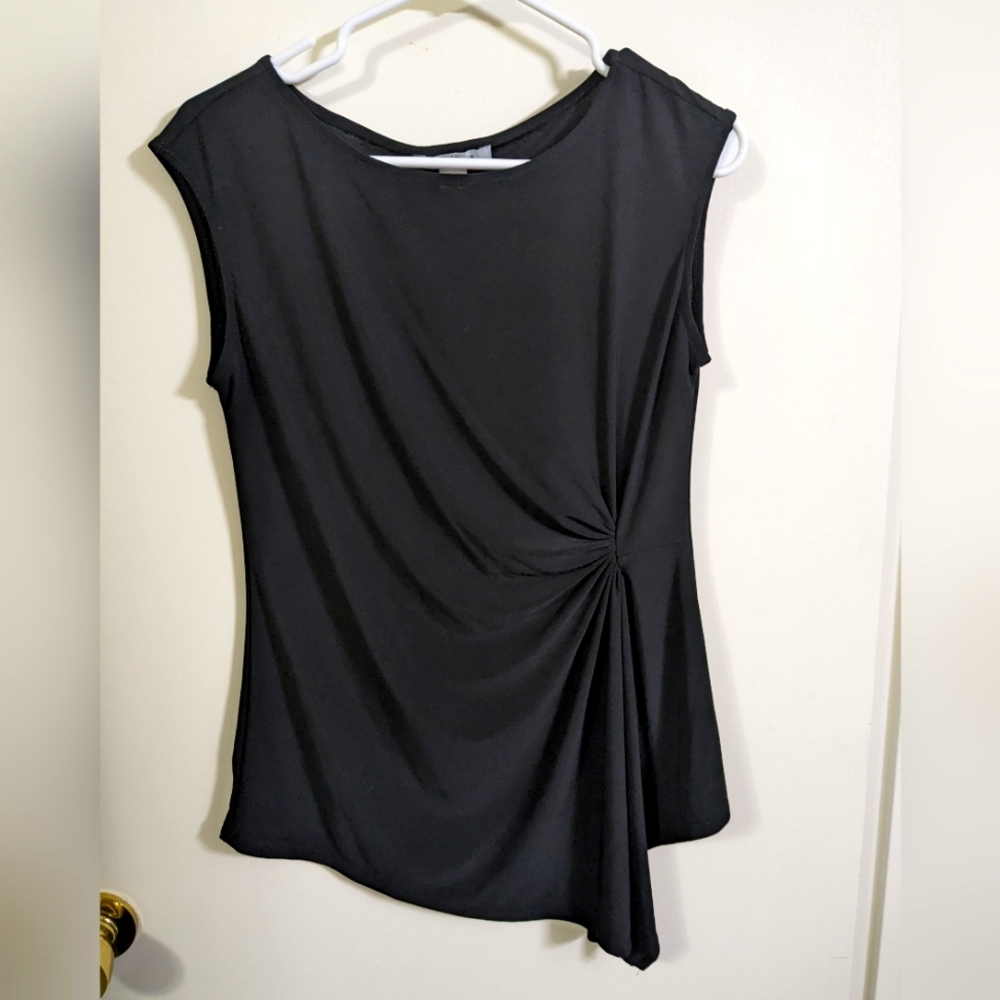 White House. Black market sleeveless blouse